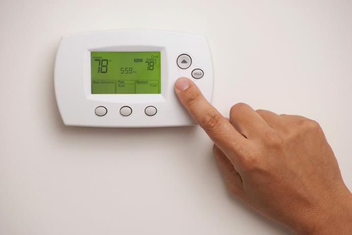 Using a thermostat can help cut electricity costs year-round
