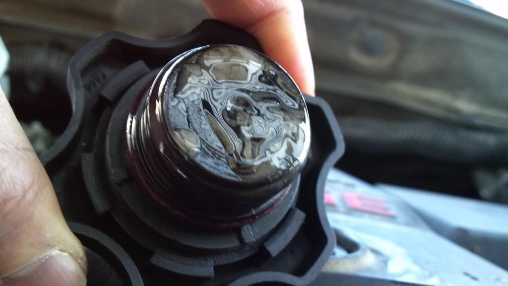Milky Sludge Under Oil Cap (Pics Attached) Cummins Diesel Forum